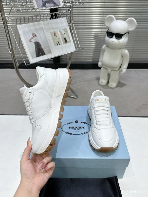 2025 Women Prada White Cow Leather Lambskin Sneakers KFY00310