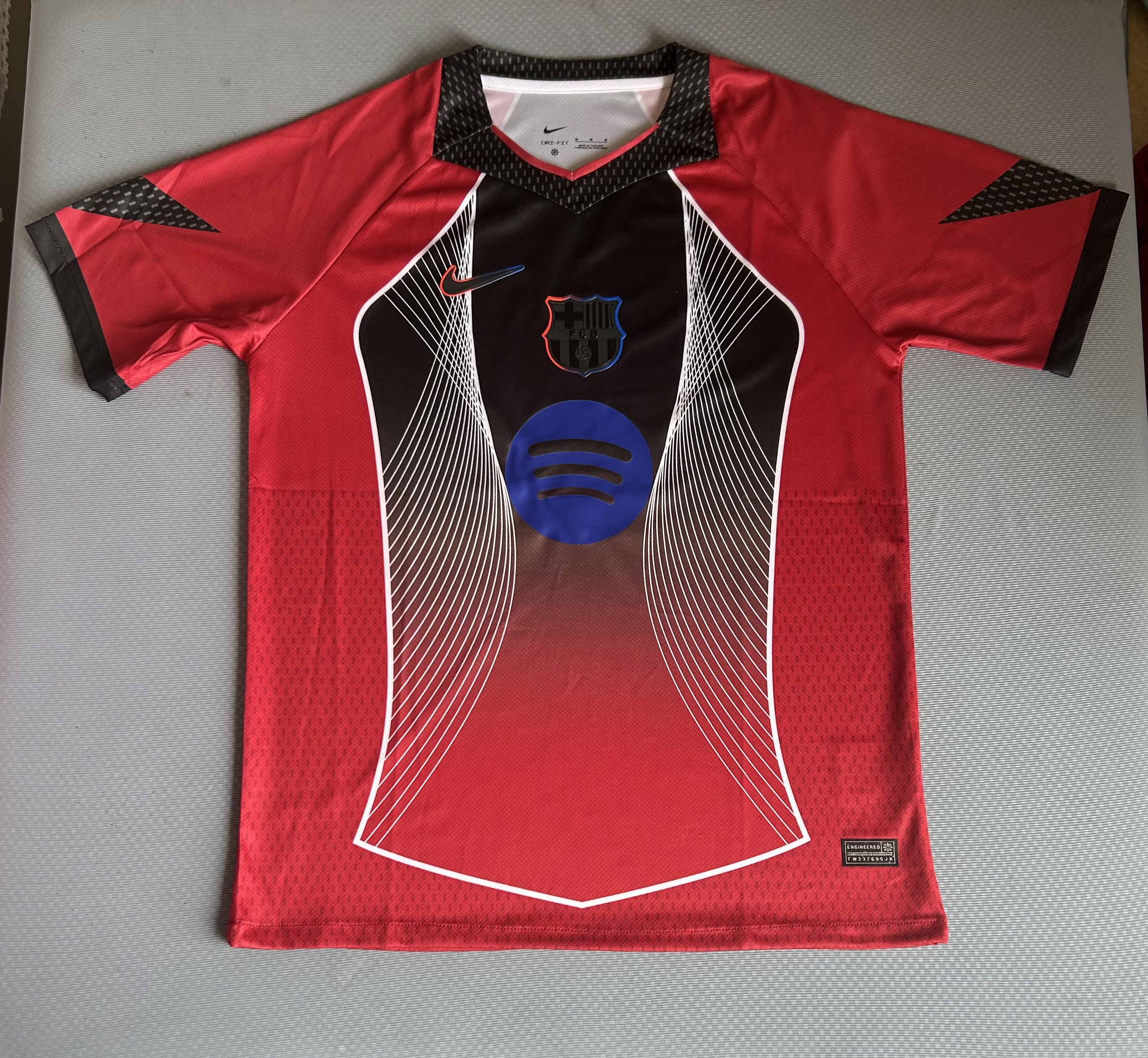 25/26 Barcelona Red with Black Panel Spotify Jersey